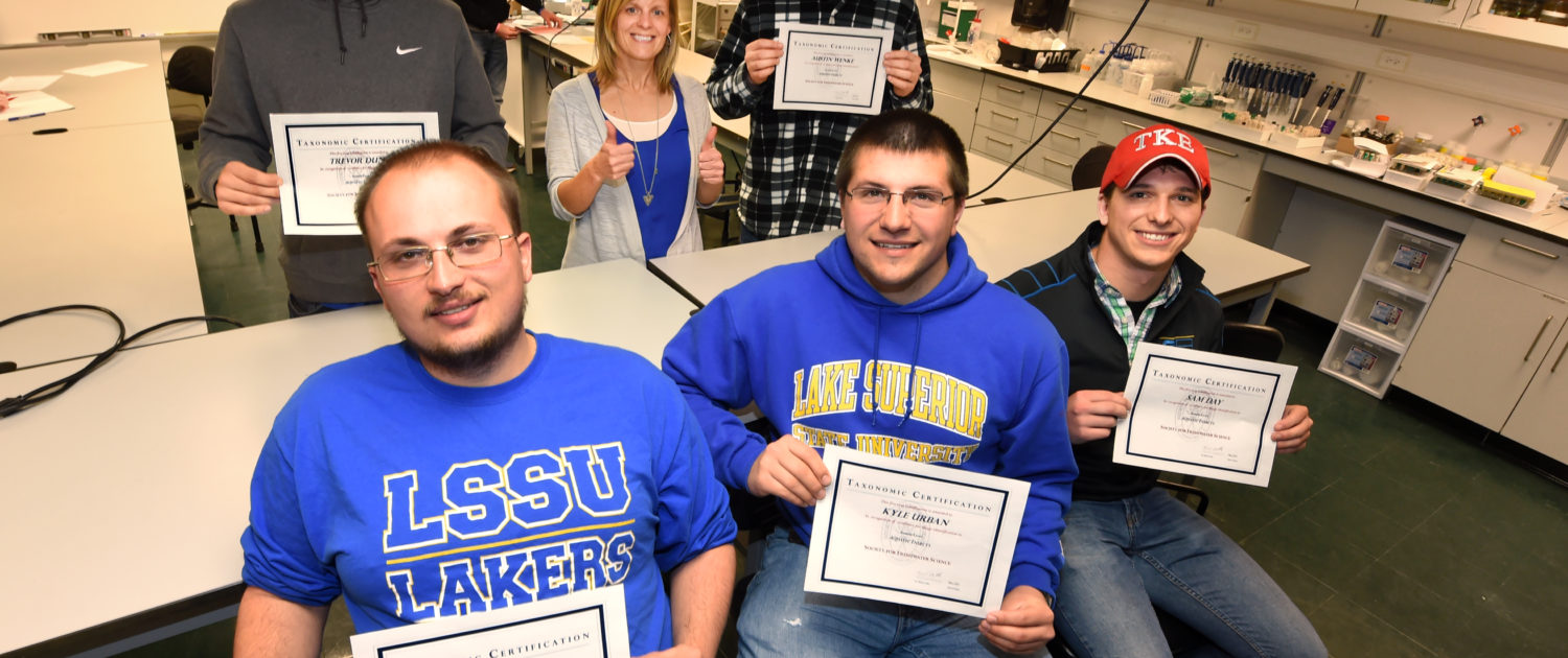 Students display their Aquatic Entomology Certificates