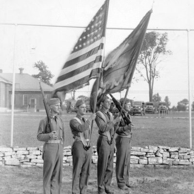 Guards posted outside the fence along Easterday Avenue.