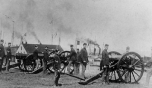 A row of cannons pointed across to the Canadian boarder, circa 1880. The cannons were used to protect the Locks and Canals from attack and were fired every spring upon the arrival of the first ship through the locks and canals.