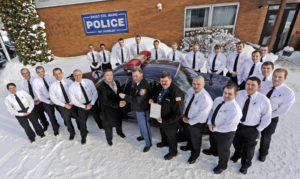 MCOLES Students surround a patrol car that was donted to the academy from the Sault Police Department