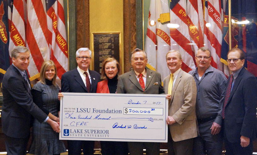 Richard and Theresa Barch present LSSU representatives with a $500,000 donation for the CFRE project