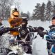 Pres. Mitchell readies on snowmobile