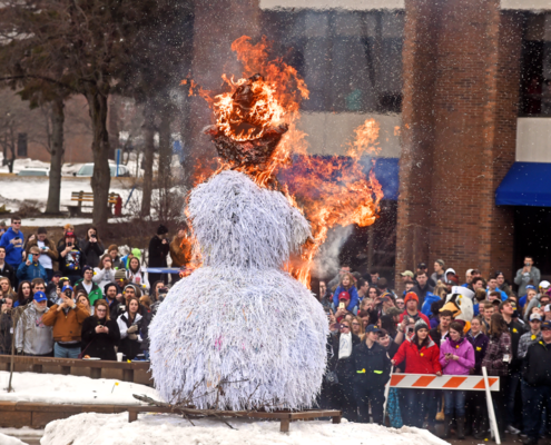 paper snowman ablaze in Cisler Center courtyard