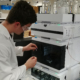 Chemistry student, Justin Blalock, calibrates an Agilent 1290 Ultra-High Pressure Liquid Chromatograph