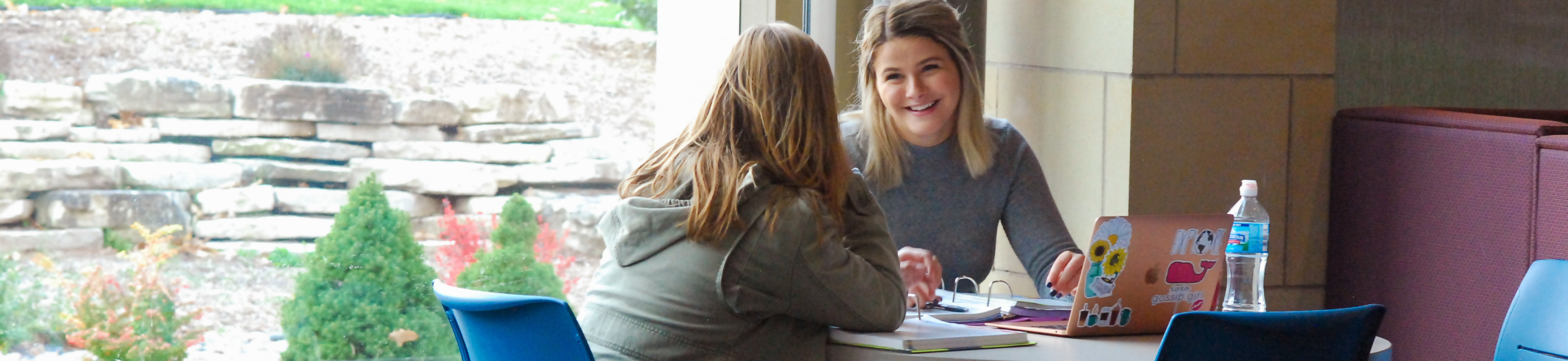 Students talking at table