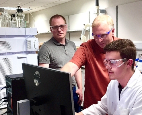 three scientists in cannabis lab