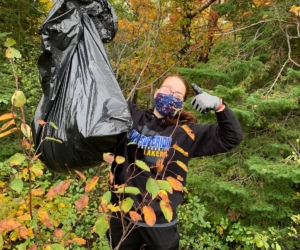 Student with a Trash Bag