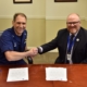 Coast Guard and LSSU leaders sign the tuition agreement
