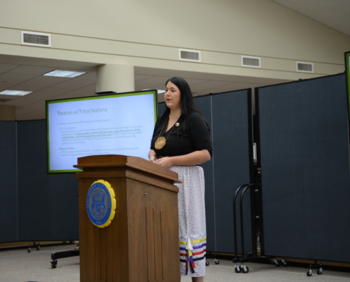 Bay Mills Indian Community Executive Council President Whitney Gravelle speaks at LSSU
