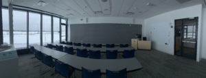 A room set up with chairs and tables