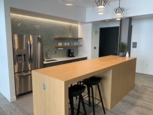 A kitchen with a wooden island