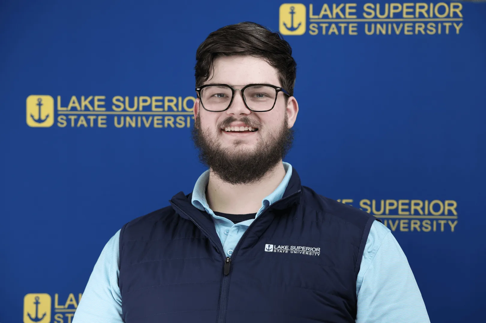 Headshot of Connor Tetzlaff, AD of University Marketing