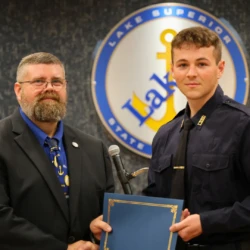 Individual graduate receives completion certificate