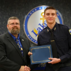 Individual graduate receives completion certificate