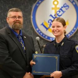 Individual graduate receives completion certificate