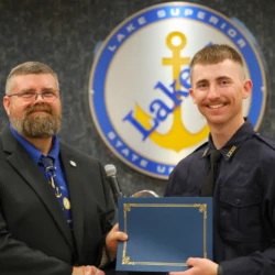 Individual graduate receives completion certificate