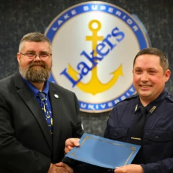 Individual graduate receives completion certificate
