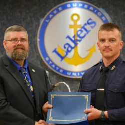 Individual graduate receives completion certificate
