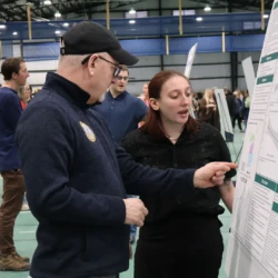 University President speaks with senior about research process and findings.