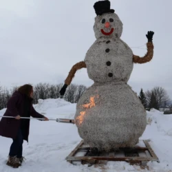 Ceremonial fire starting of snowman.