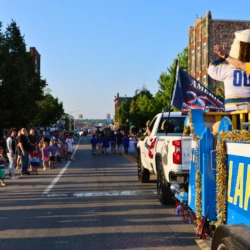 LSSU Float with Mascot and President during parade