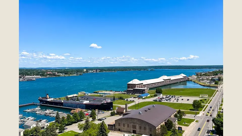 Drone image of Soo, Michigan with the Cloverland Electric power canal featured.