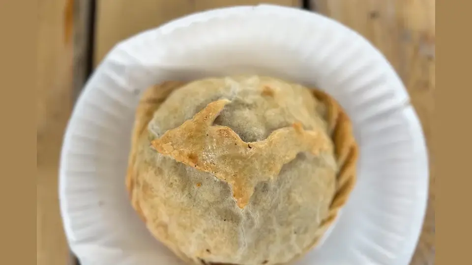 Pasty featuring the shape of the Upper Peninsula on the dough.